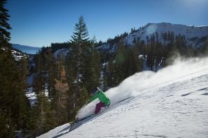 Alpine skier, terrain-Lake shot