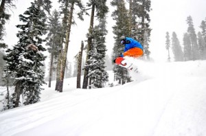 Bear Valley snowboarder getting air.