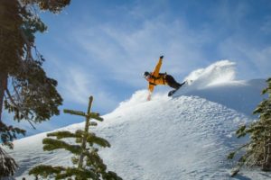A snowboarder heads down a steep run at Sugar Bowl Resort.