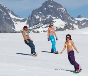 Spring skiing at Mammoth Mountain and other California ski resorts typically means less heavy clothing in very pleasant weather. 