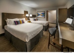 The newly renovated contemporary rooms at Hotel Becket feature handcrafted architectural details such as recycled barn wood doors, as well as custom artwork reminiscent of the mountain lakes found throughout the Sierra.