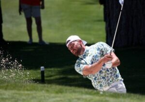 Travis Kelce hits a bunker shot at the Tahoe celebrity golf tournament, which this year takes place July 12-14.